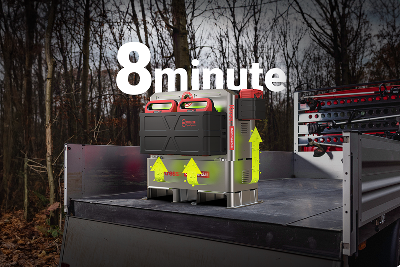 Kress Charger with Batteries on a truck bed with '8 minute' branding and arrows pointing towards it, set against a forest background.