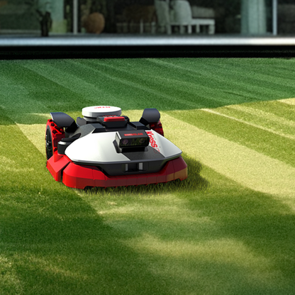 Robotic lawn mower on a green lawn with a blurred background